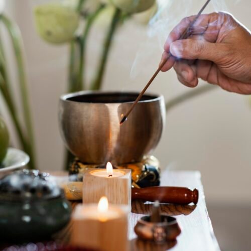 side-view-man-lighting-incense-stick Vasuki Healing – Activate Divine Protection & Inner Power